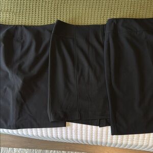 Three black skirts